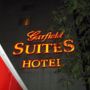 Фото 9 - Garfield Suites Hotel