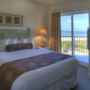 Фото 2 - Sunset Vistas Two Bedroom Beachfront Suites